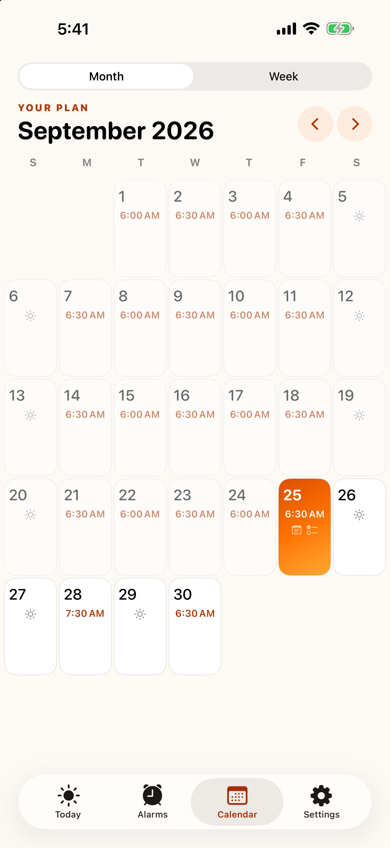 Monthly calendar view showing daily alarm times and day types